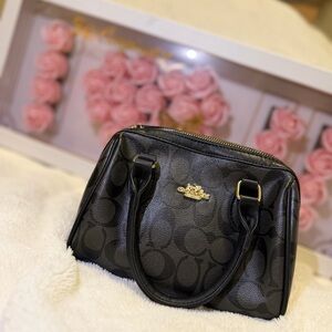 Coach Black Mini Bag with Gold Accents